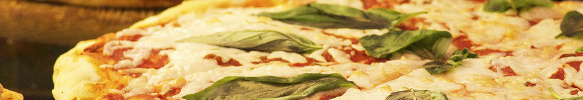 Eating Italian Pizza at Giuseppe's Pizzeria & Ristorante restaurant in Meredith, NH.
